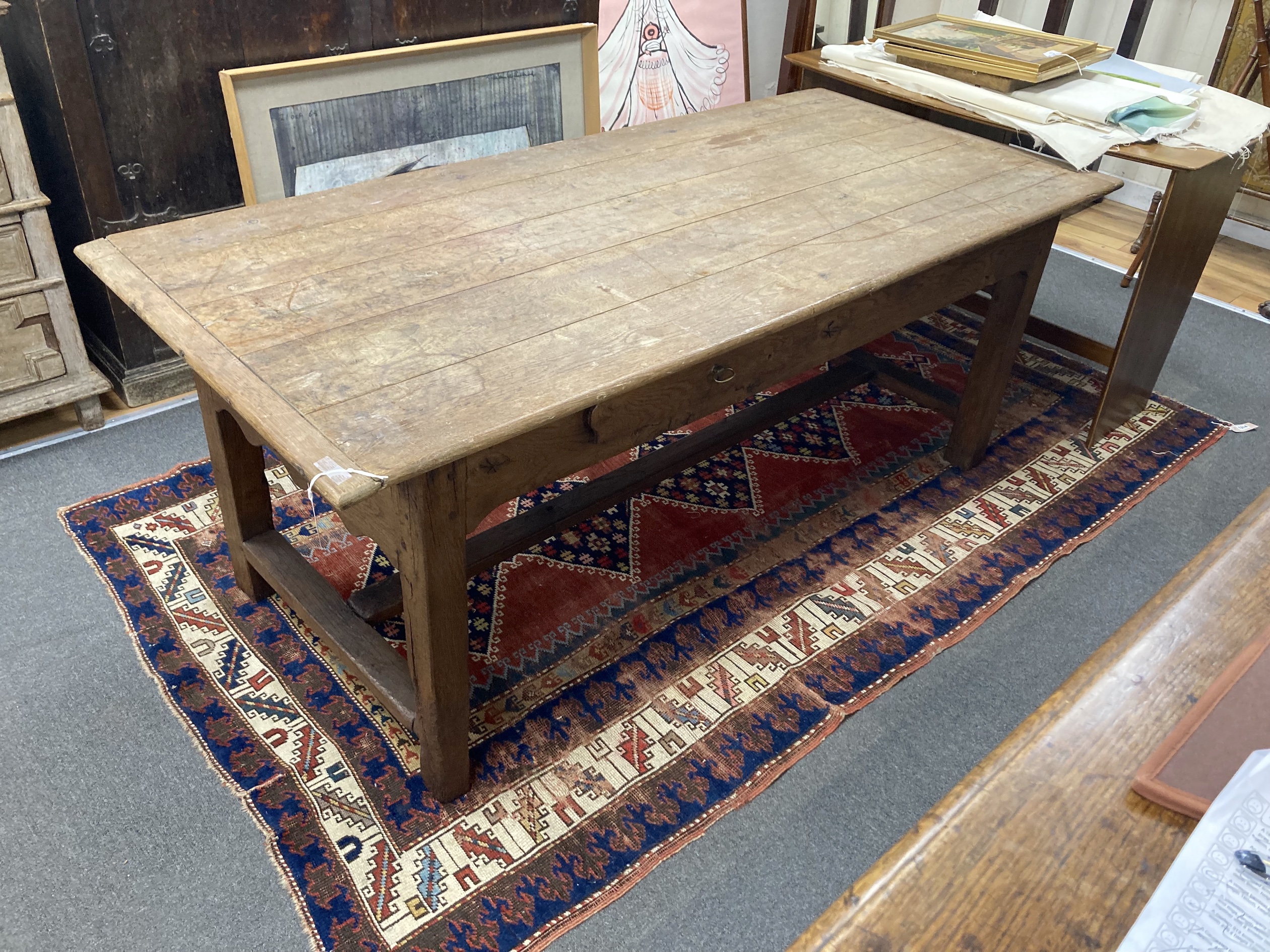 A 19th century French rectangular oak farmhouse table, length 180cm, depth 81cm, height 71cm